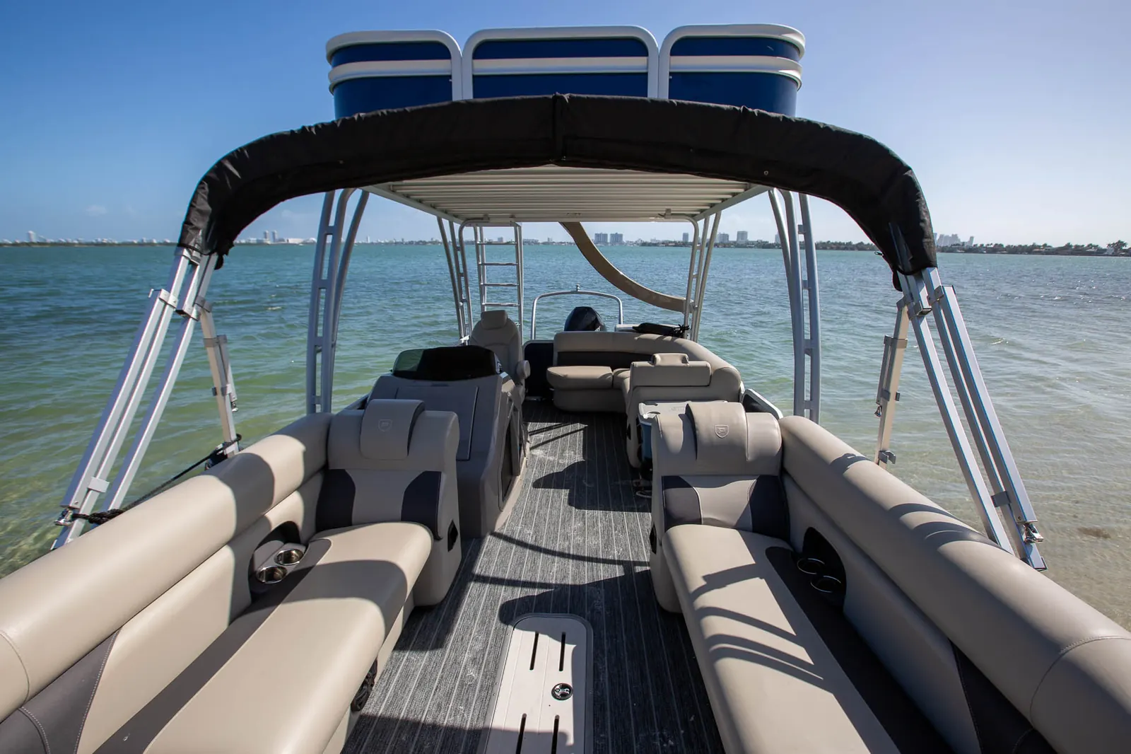 Tritoon lounge seating under the upper deck